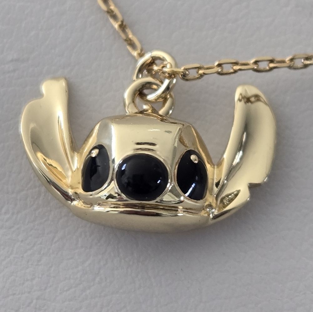 Stitch Gold-Tone Necklace with Hibiscus Flower & Crystal Accents - Picture 3 of 11